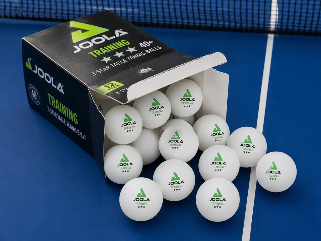 JOOLA Training 3-Star ping pong balls spilling out of the box